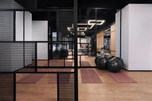 a gym with a bunch of balls in a room at Citadines Sudirman Jakarta in Jakarta