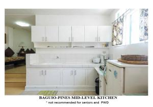 Kuchyň nebo kuchyňský kout v ubytování Agreeable Family Baguio Suites