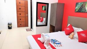 Postel nebo postele na pokoji v ubytování Spiral Suites Hotel