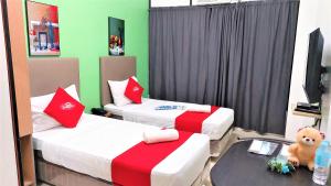 TV a/nebo společenská místnost v ubytování Spiral Suites Hotel