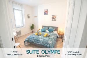 Postelja oz. postelje v sobi nastanitve KASA Suite - Studio tout équipé et Cosy