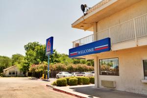 a welcome sign for a walgreens building at Motel 6-Irving, TX - Dallas in Irving