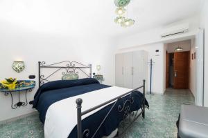 A bed or beds in a room at B&B Palazzo Pinto