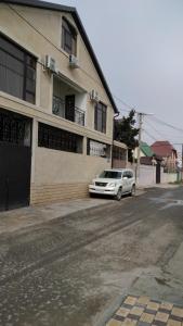 a car parked in front of a building at Guest house U Morya in Derbent