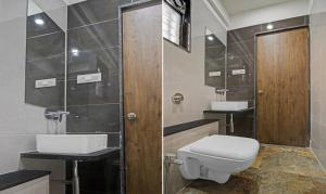 Uma casa de banho em Treebo Chandraprasth Residency