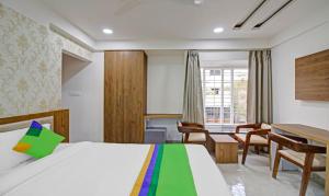 Uma cama ou camas num quarto em Treebo Chandraprasth Residency