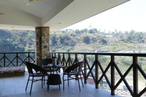 Μπαλκόνι ή βεράντα στο Ghughuti Baasa Home Stay, Dehradun