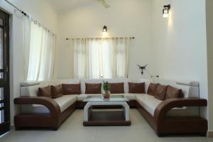 Χώρος καθιστικού στο Ghughuti Baasa Home Stay, Dehradun