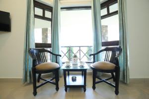 Χώρος καθιστικού στο Ghughuti Baasa Home Stay, Dehradun +29 φωτογραφίες