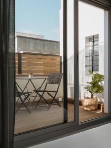 A balcony or terrace at Apartamentos Espai Progres by Be Barcelona