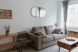 A seating area at Apartamentos Espai Progres by Be Barcelona