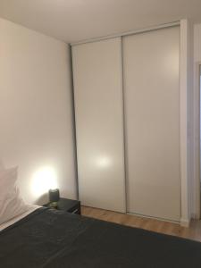 מיטה או מיטות בחדר ב-T3 avec parking gratuit sur place à Toulouse