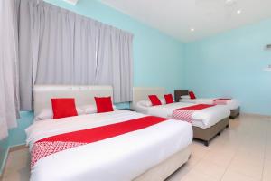 Voodi või voodid majutusasutuse OYO 90132 Come Inn Premium toas