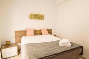 Posteľ alebo postele v izbe v ubytovaní Letmalaga Economy San Telmo