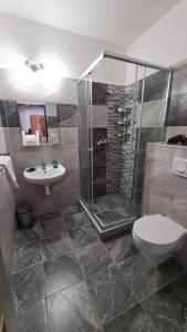 Koupelna v ubytování Hotel Pangea