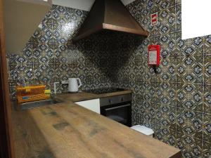 Kuchyň nebo kuchyňský kout v ubytování Casa da Azenha