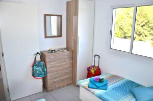 Łóżko lub łóżka w pokoju w obiekcie Ferienwohnung CENTRAL - COSTA CALMA - WiFi - Innenstadt