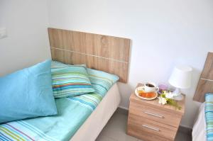 Łóżko lub łóżka w pokoju w obiekcie Ferienwohnung CENTRAL - COSTA CALMA - WiFi - Innenstadt