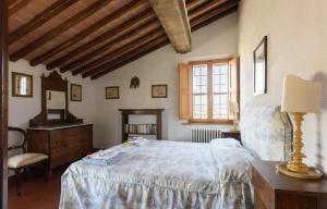 מיטה או מיטות בחדר ב-Agriturismo Poggio Repenti