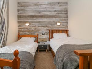Katil atau katil-katil dalam bilik di Bryngolau