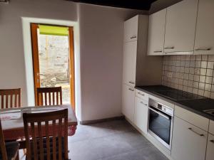 Kuchyň nebo kuchyňský kout v ubytování Casa Antica Corte