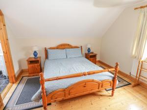 Een bed of bedden in een kamer bij 8 Lios Na Sioga