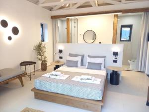 Posteľ alebo postele v izbe v ubytovaní Niki Luxury Apartments Niki Suites Petra