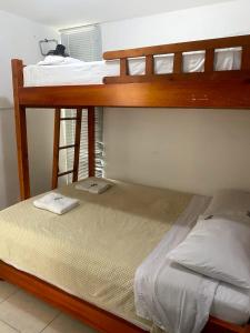 a couple of bunk beds in a room at Apartamento turistico cerca al parque del café en Montenegro Quindío in Montenegro +15 photos