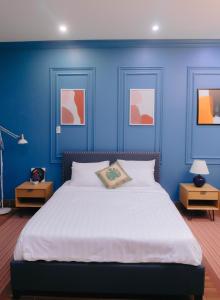 מיטה או מיטות בחדר ב-Bich Ngoan HOTEL