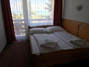 Posteľ alebo postele v izbe v ubytovaní Nereus Park Hotel