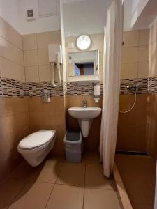 Kúpeľňa v ubytovaní Nereus Park Hotel