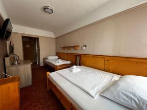 Posteľ alebo postele v izbe v ubytovaní Nereus Park Hotel
