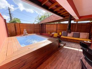 a hot tub in the middle of a patio at Chez Rey in Médecin