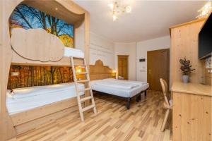 Postel nebo postele na pokoji v ubytování Hotel Franco