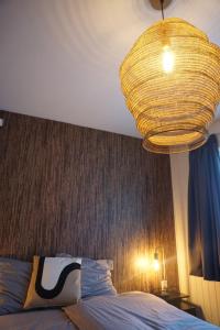 Postel nebo postele na pokoji v ubytování Bed and Breakfast Kik en Bun