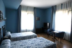 Cama o camas de una habitación en Gran Hotel Balneario de Liérganes
