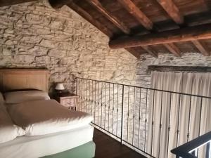Postel nebo postele na pokoji v ubytování Cascina Belvedì
