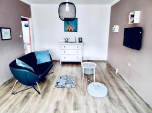 TV a/nebo společenská místnost v ubytování Apartmán Domov Děčín