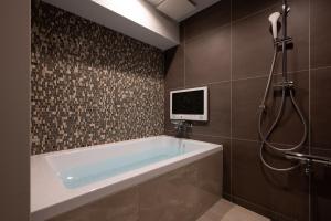 Koupelna v ubytování hotel brattostay ホテル ブラットステイ