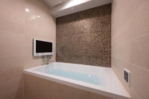 Koupelna v ubytování hotel brattostay ホテル ブラットステイ
