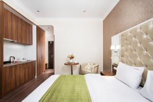 Postel nebo postele na pokoji v ubytování BonApart Hotel by UHM