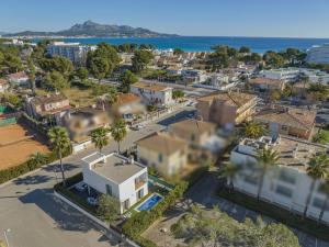 an aerial view of a city with the ocean at Villa Salines House in Alcudia