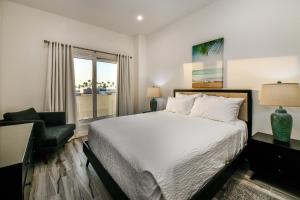 Ένα ή περισσότερα κρεβάτια σε δωμάτιο στο The Cove Condominium 101 +48 φωτογραφίες