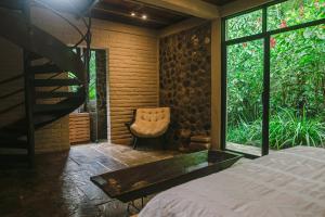 Voodi või voodid majutusasutuse Hamadryade Lodge toas