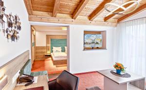 Postel nebo postele na pokoji v ubytování Kur- und Wellnesshotel Förch