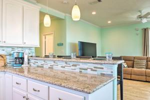 a kitchen with a large counter top in a room at Furnished Deck + Ocean Views: Surfside Beach Home in Surfside Beach