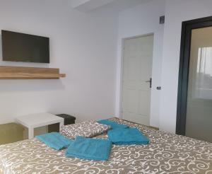 Postel nebo postele na pokoji v ubytování Vila Ayra