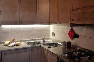 A kitchen or kitchenette at Suite - La Casa del Maestro