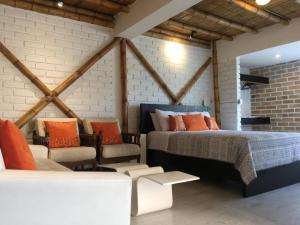 Postel nebo postele na pokoji v ubytování "Bambú Sierra" Cozzy Ecológical Lofts