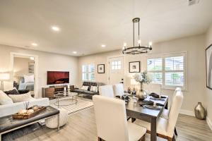 a dining room and living room with a table and chairs at Chic Lincoln City Retreat on Oregon Coast in Lincoln City